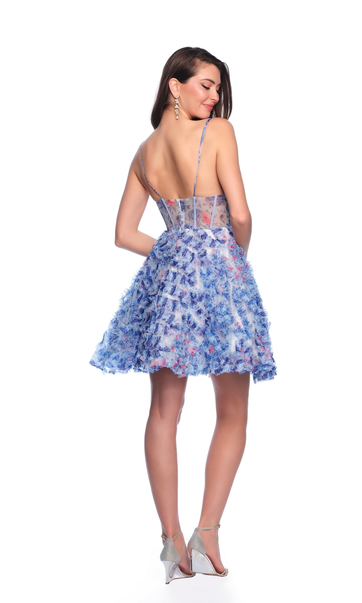 Smiling woman in the Dave and Johnny Short Blue Floral Hoco Dress 11768—sleeveless, knee-length with thin straps and open back—a gorgeous choice for homecoming or any special event.